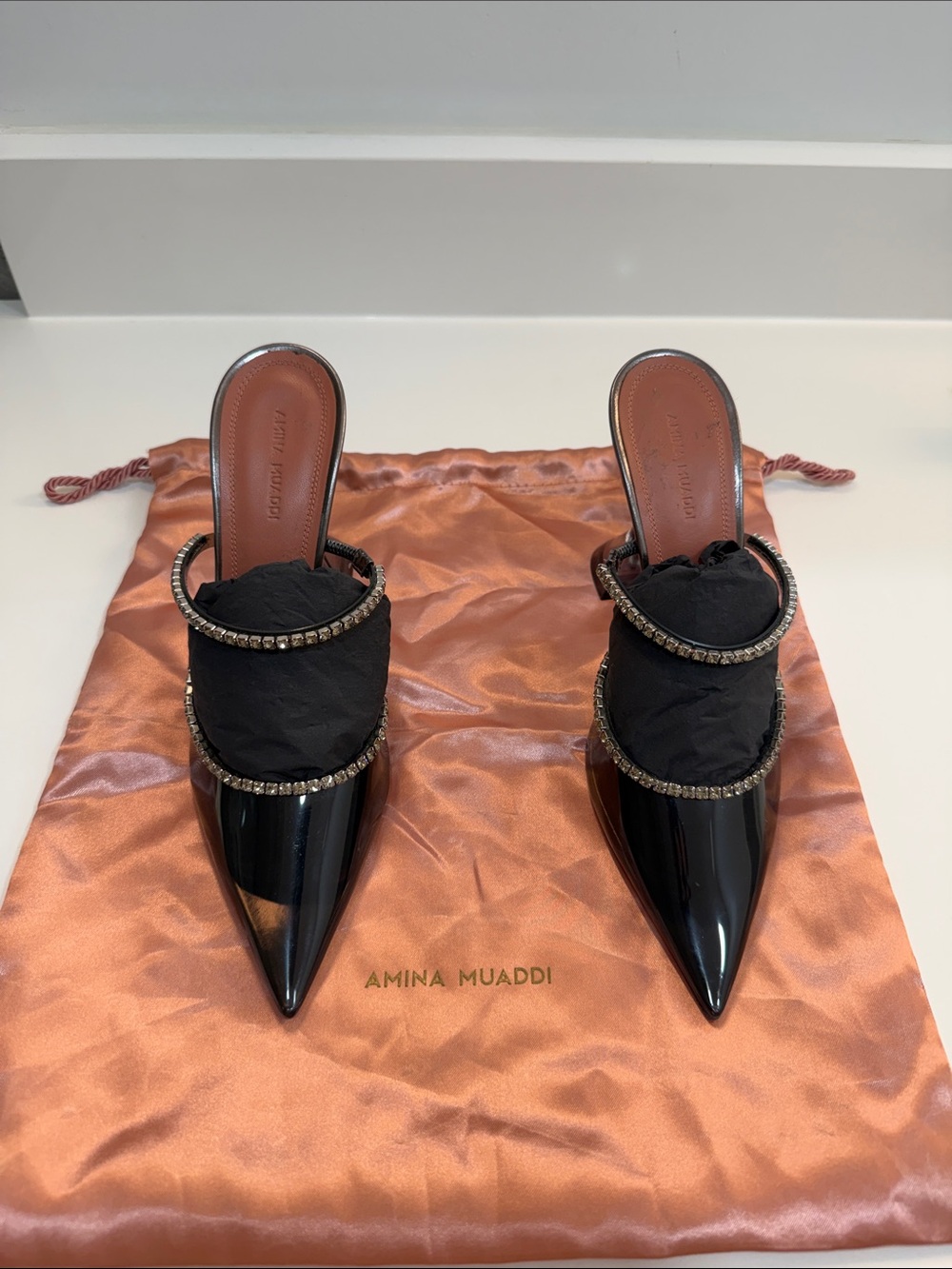 Amina Muaddi Black Patent Leather Crystal-Embellished Pointed Mules
